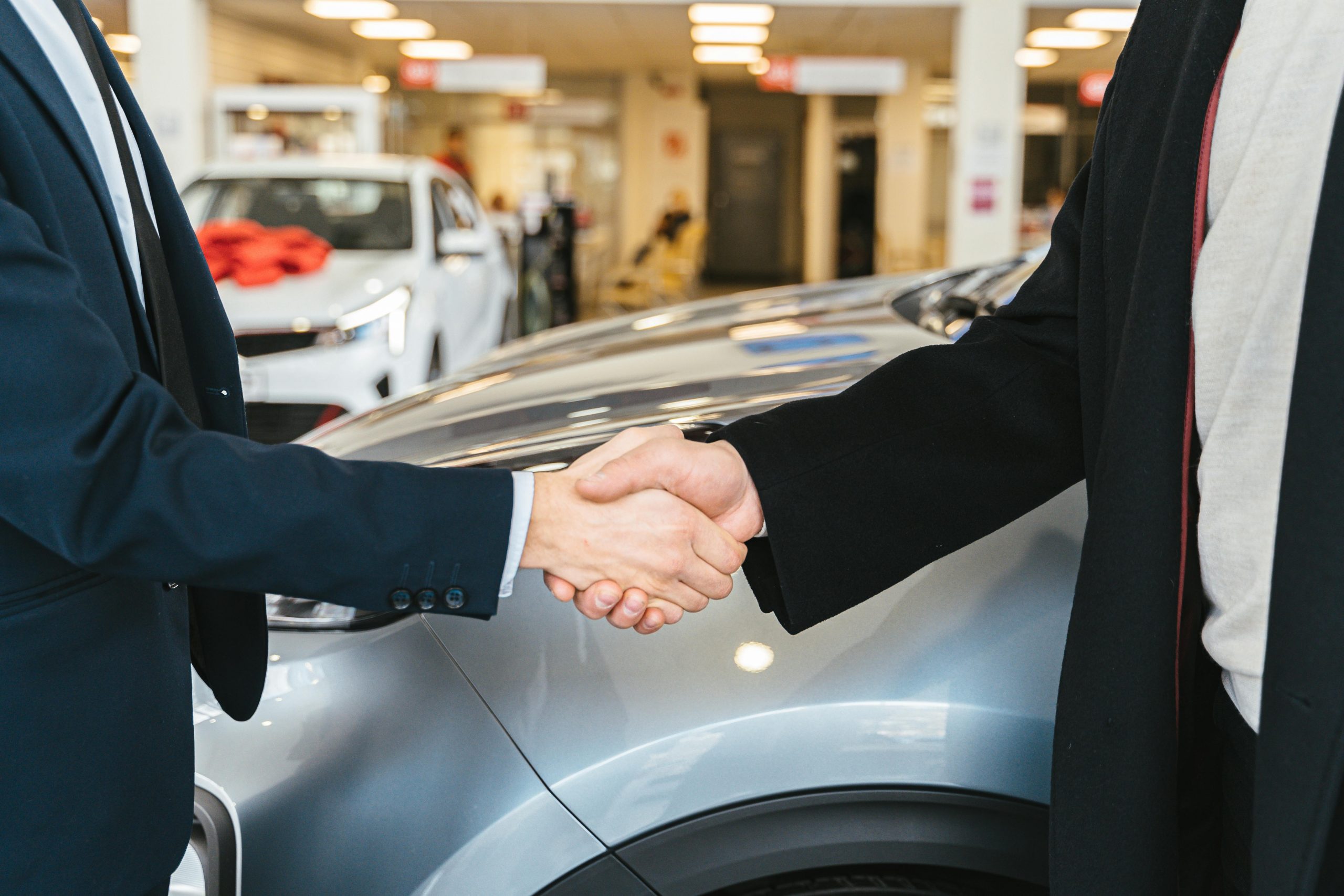 Car dealership setting up auto transport