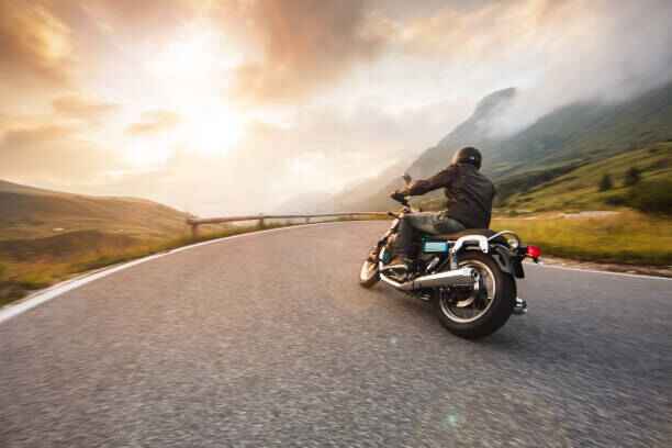 Motorcycle rider enjoying a ride on his bike on the open road