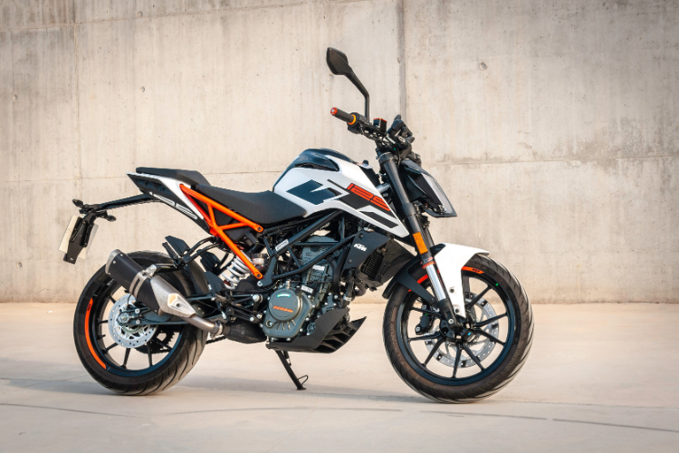 Beginner Motorcycle Parked Against Concrete Wall