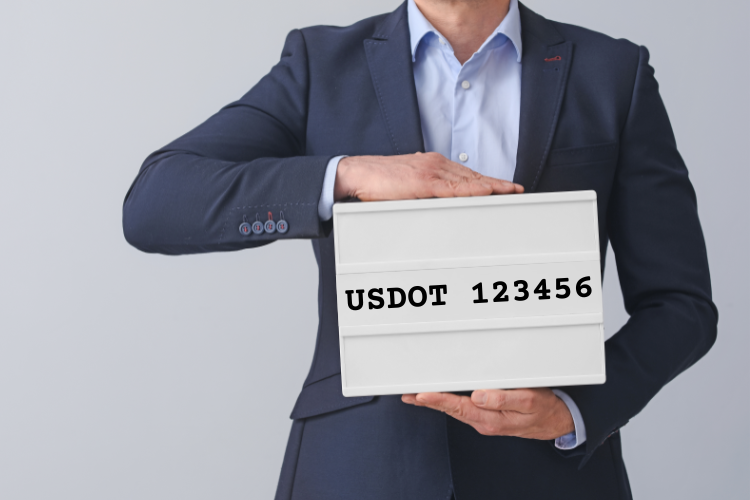 Man holding USDOT number display board
