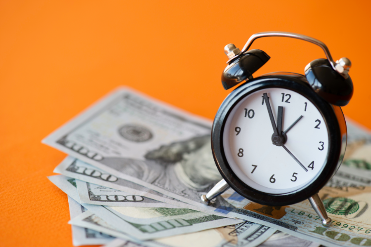 Alarm clock on cash saving time