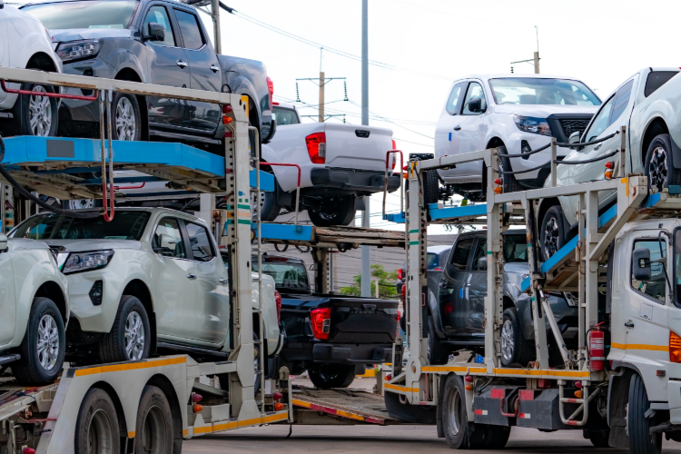 Car carriers transporting multiple new vehicles
