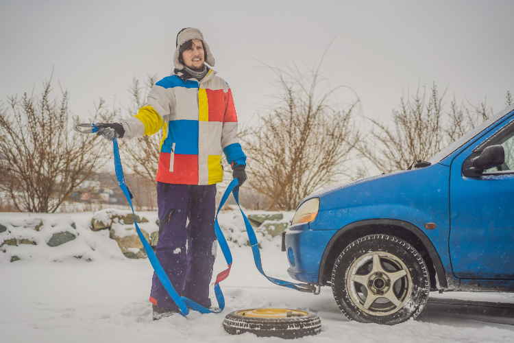 Man Preparing Car For Flat Towing