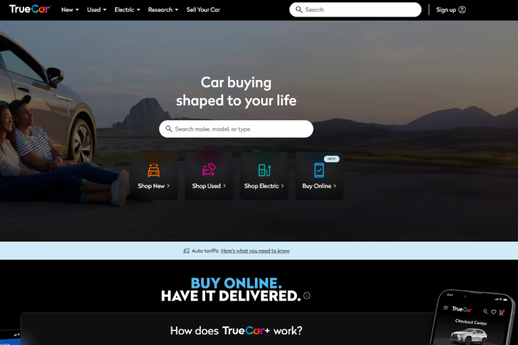 TrueCar Homepage with Couple Beside Vehicle