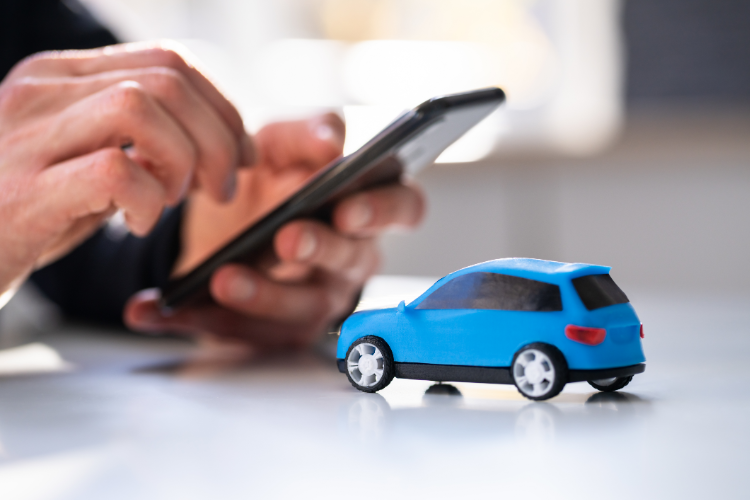 Alt Text Person Using Smartphone To Set Car Price