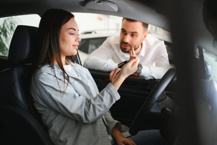 Buyer Inspecting Car Before Final Purchase