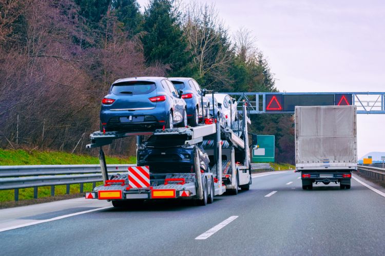 Car carrier truck transporting new vehicles