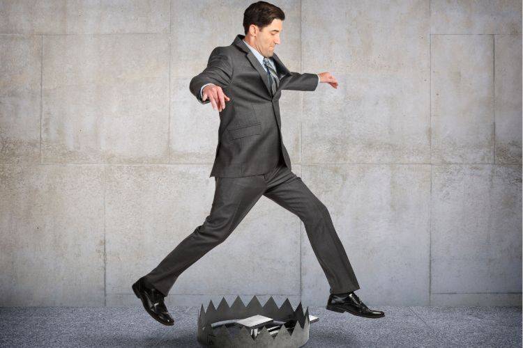 Man Stepping Over Car Shipping Scam