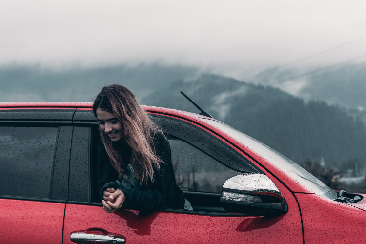 Student Considering Car Purchase In Rainy Weather