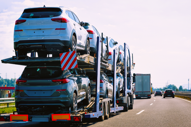 College Car Shipping Transport Truck On Highway