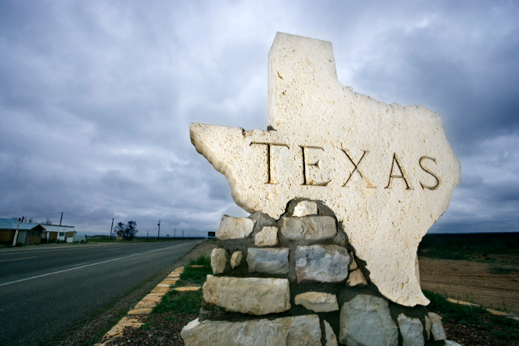 Texas State Stone Sign Along Road