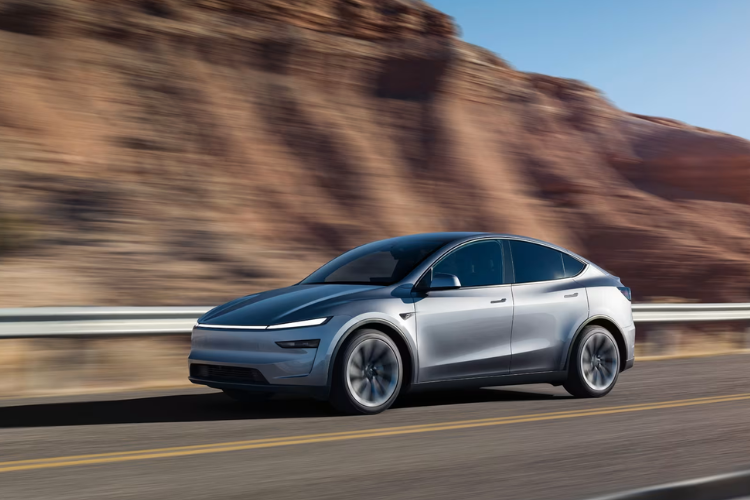 Silver Tesla Model Y Driving Highway