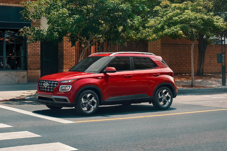 Red Hyundai Venue Parked On Street