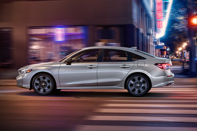 Honda Civic Driving Through City At Night