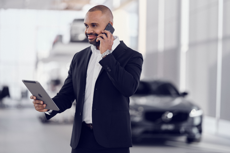 Businessman Calling Seller About Used Car